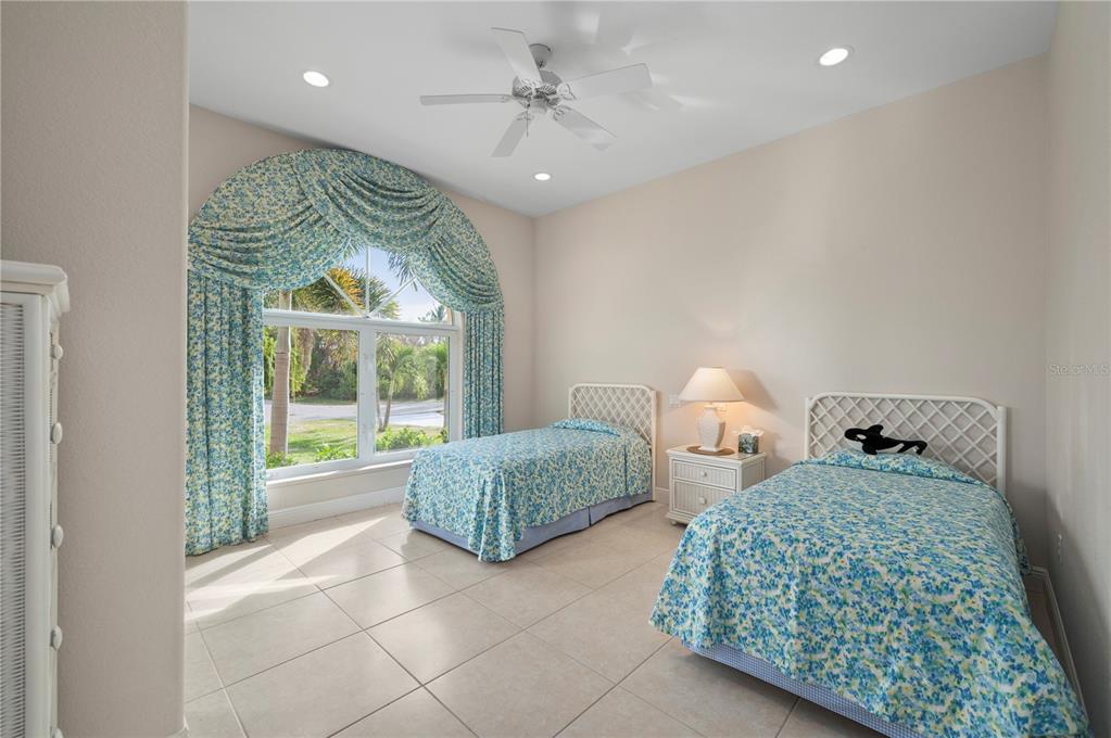 1030 Conecta Drive Punta Gorda, FL 33950 - Photo 46 of 74 a bedroom with two beds and a large window