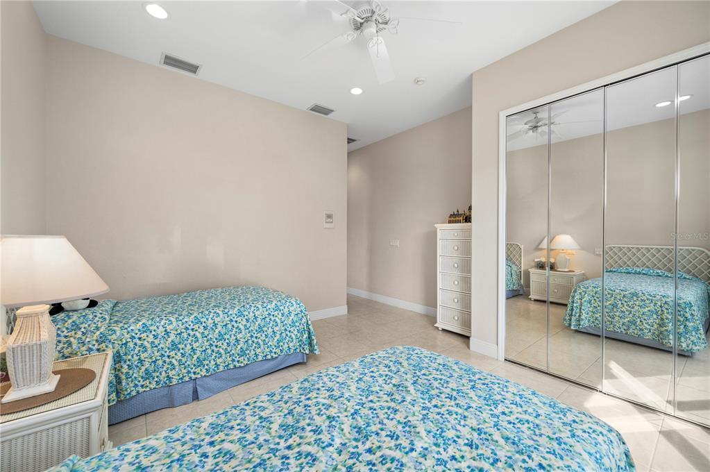 1030 Conecta Drive Punta Gorda, FL 33950 - Photo 48 of 74 a bedroom with a bed and a dresser