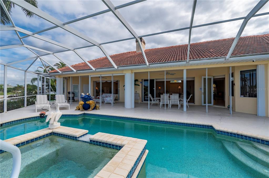 1030 Conecta Drive Punta Gorda, FL 33950 - Photo 58 of 74 a view of a swimming pool with a patio