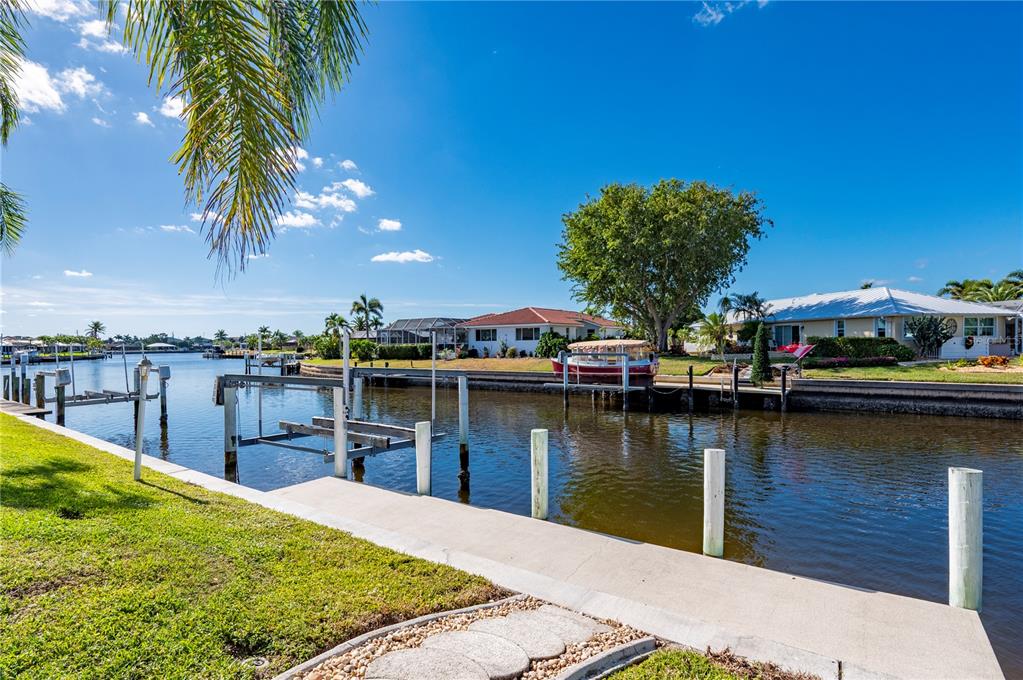 1030 Conecta Drive Punta Gorda, FL 33950 - Photo 64 of 74 a view of a lake with boats
