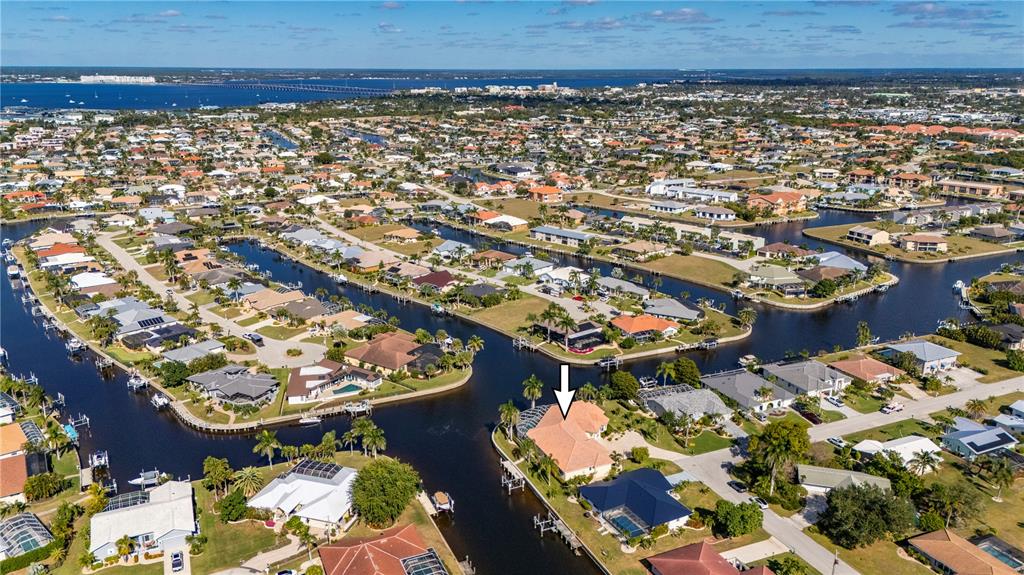 1030 Conecta Drive Punta Gorda, FL 33950 - Photo 72 of 74 an aerial view of residential houses with outdoor space