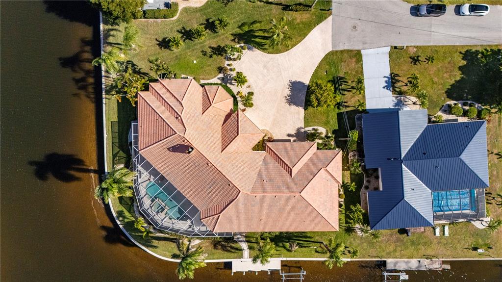 1030 Conecta Drive Punta Gorda, FL 33950 - Photo 74 of 74 an aerial view of a house with swimming pool and outdoor space