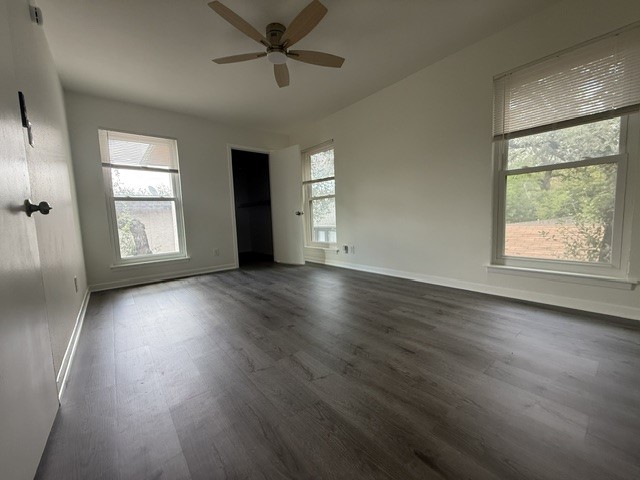 3304 Clawson Road, Unit B Austin, TX 78704 - Photo 9 of 12 Laminate flooring and well-lit windows define this inviting, spacious bedroom.