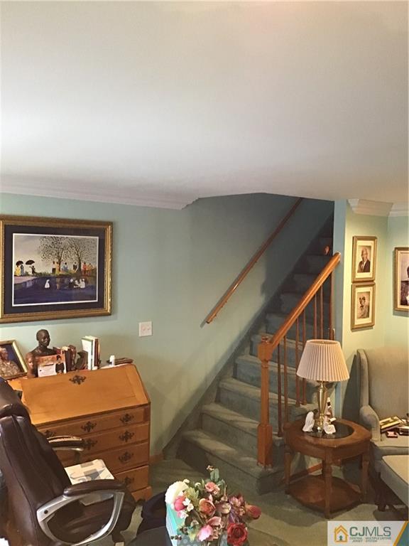 24 Latonia Street Edison, NJ 08817 - Photo 6 of 7 a living room with furniture and wooden floor