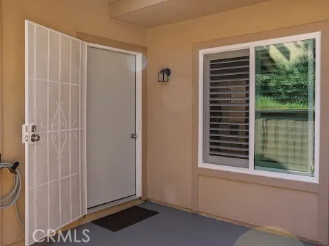 a view of a room that has a large window