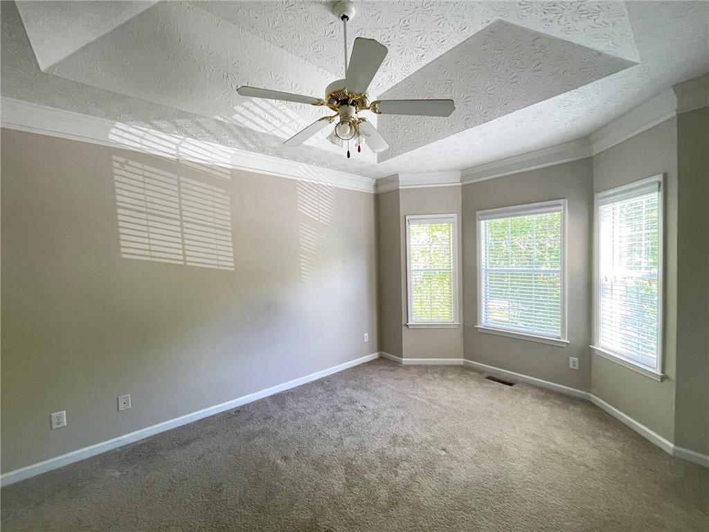 95 Luke Drive Dallas, GA 30132 - Photo 8 of 15 a view of an empty room with a window