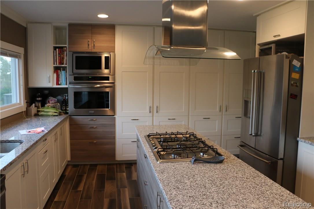 71950 Dequindre Road Romeo, MI 48065 - Photo 10 of 39 Beautiful Kitchen w/ stainless steel appliances and granite counters