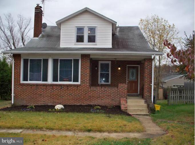 4511 Powder Mill Road Beltsville, MD 20705 - Photo 13 of 13 a view of a house with a yard