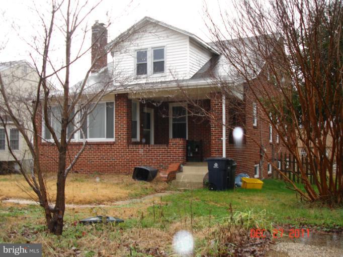 4511 Powder Mill Road Beltsville, MD 20705 - Photo 6 of 13 a view of a house with backyard and sitting area