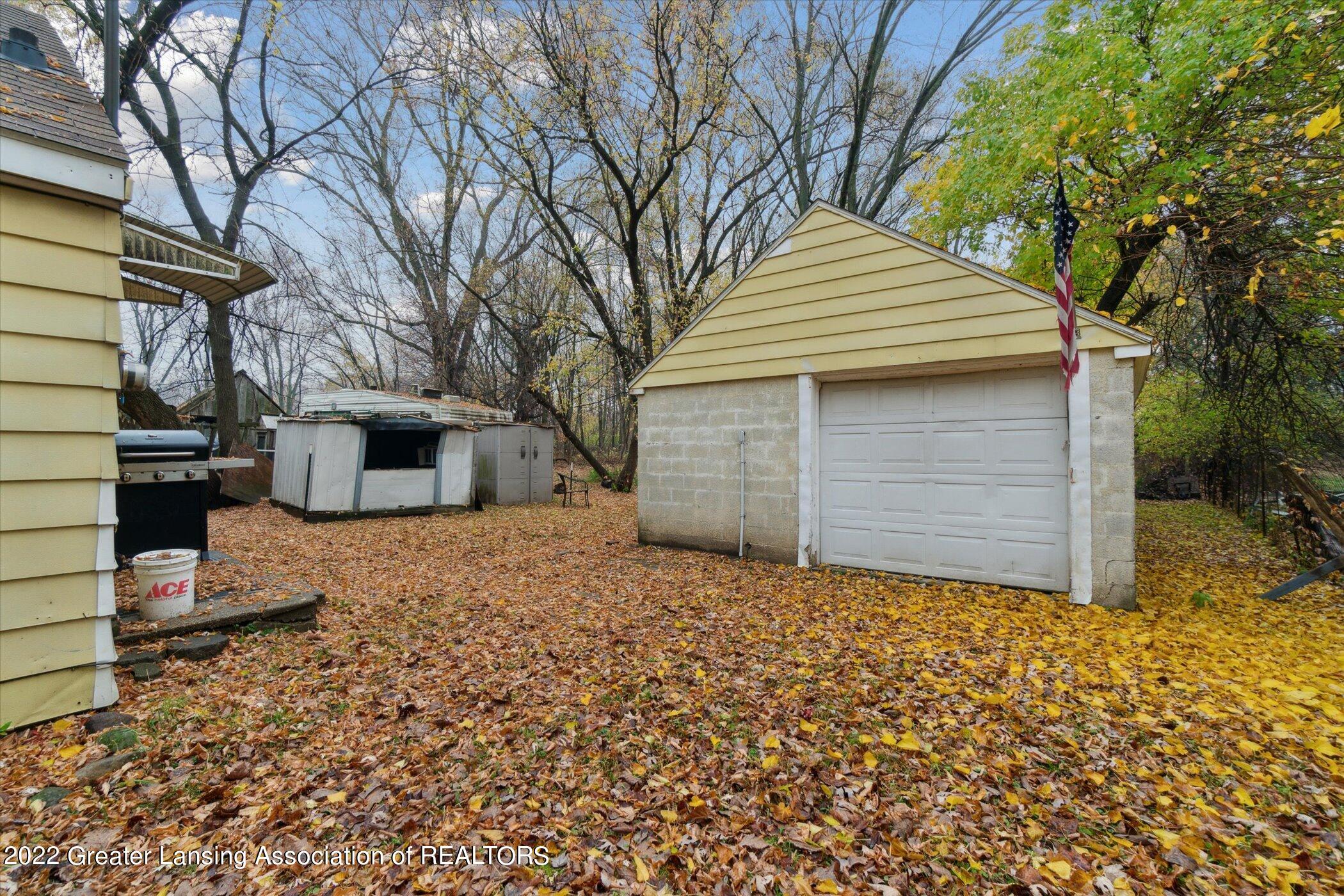 5439 Hughes Road Lansing, MI 48911 - Photo 9 of 10 11-5439-Hughes-Rd-WindowStill-Real-Estat