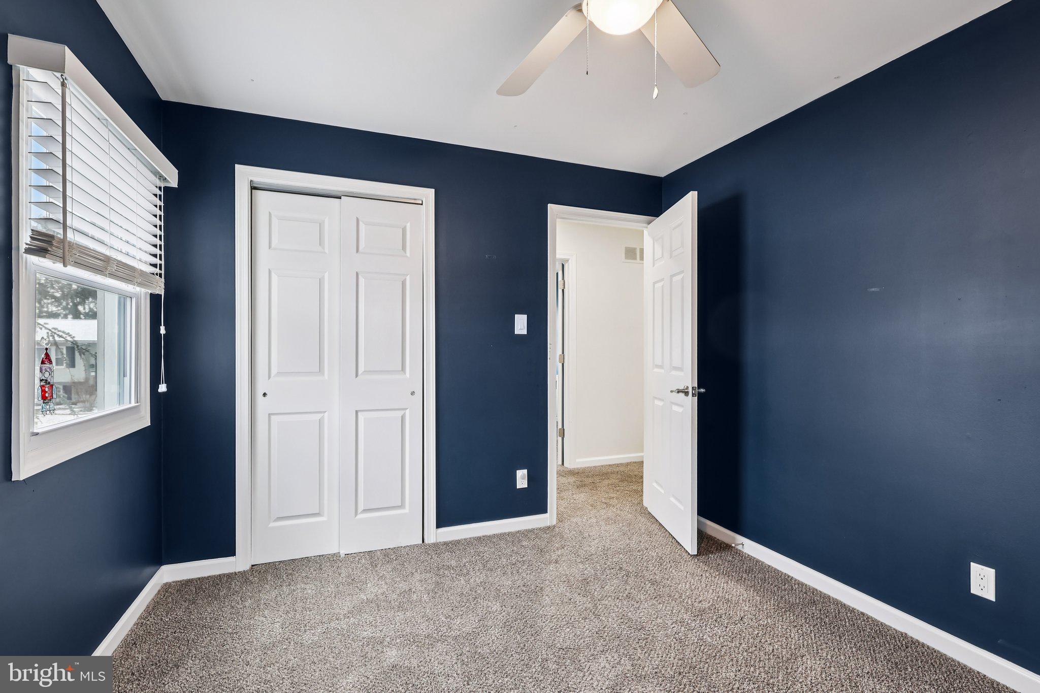103 Anglin Drive Newark, DE 19713 - Photo 20 of 25 an empty room with windows and closet