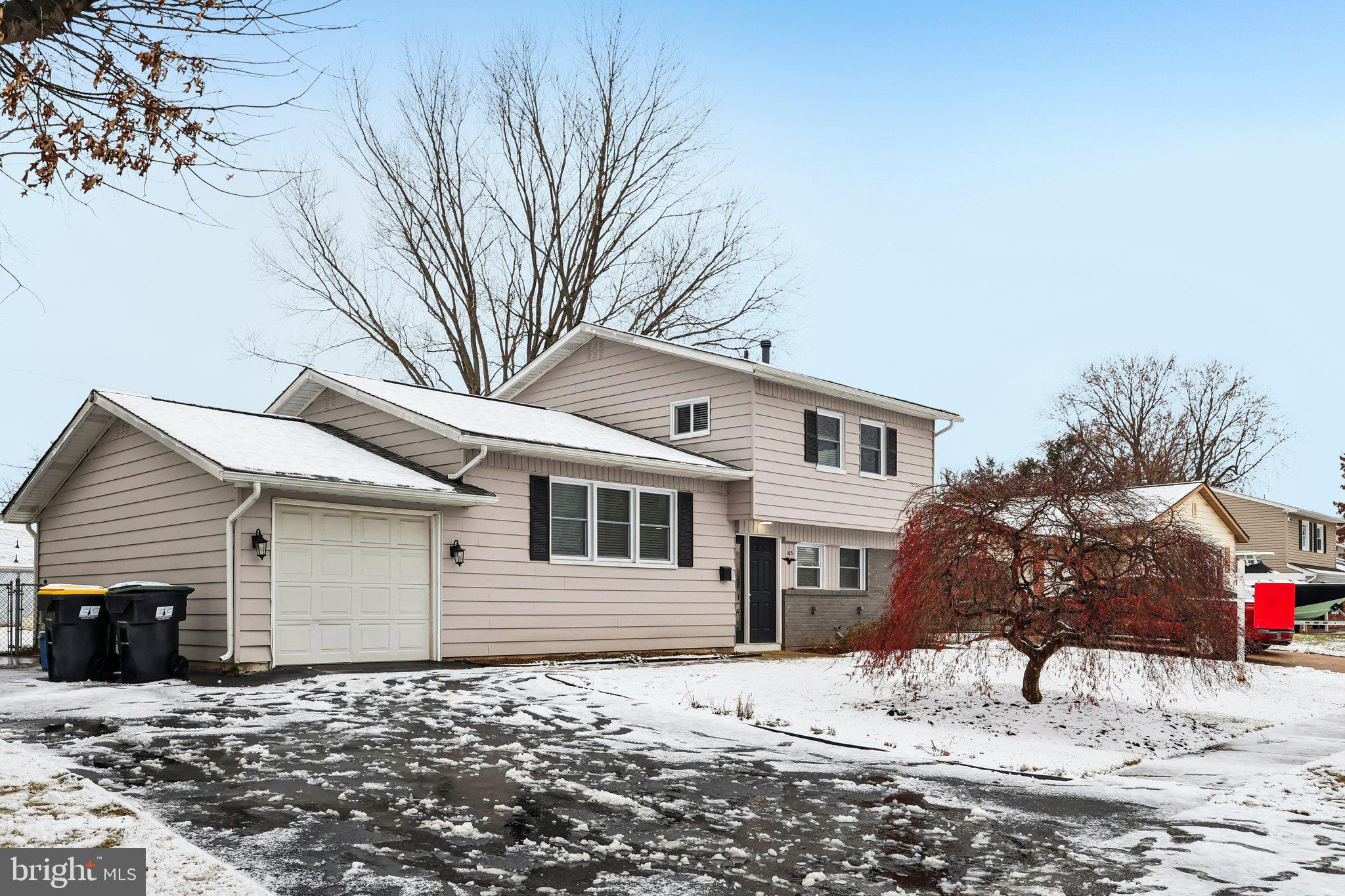 103 Anglin Drive Newark, DE 19713 - Photo 2 of 25 a front view of a house with a yard
