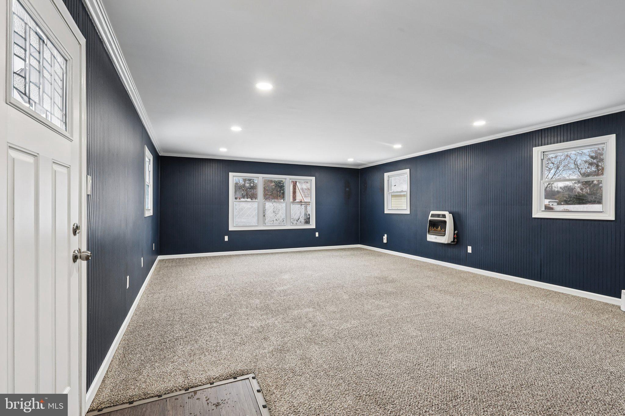 103 Anglin Drive Newark, DE 19713 - Photo 6 of 25 a view of an empty room with a window