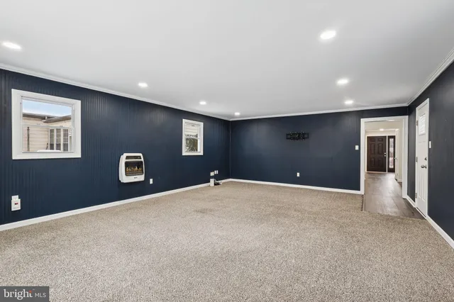 a view of a livingroom with a staircase