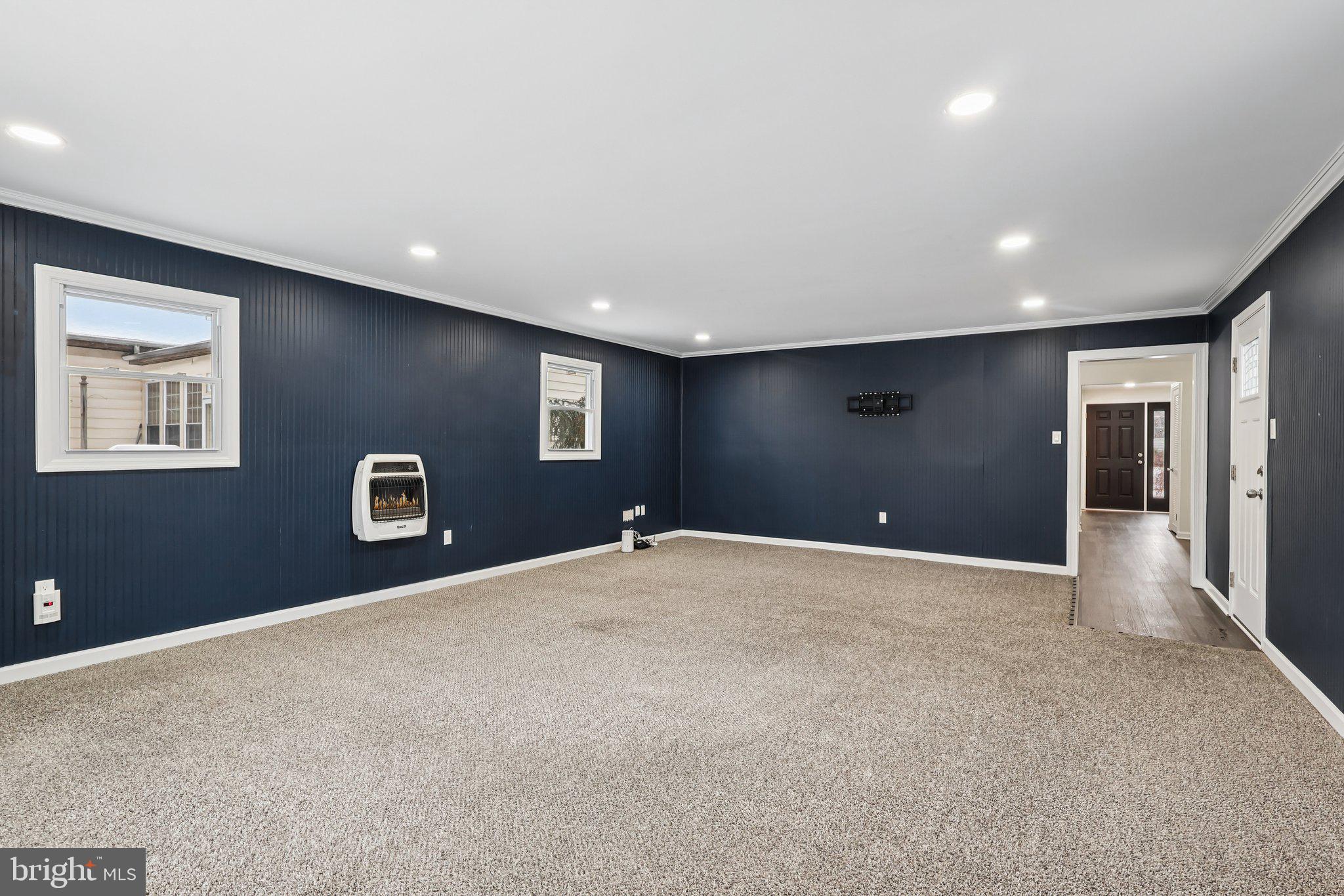 103 Anglin Drive Newark, DE 19713 - Photo 7 of 25 a view of a livingroom with a staircase