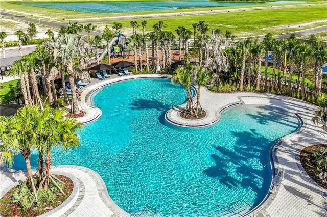 a view of a porch with furniture and yard