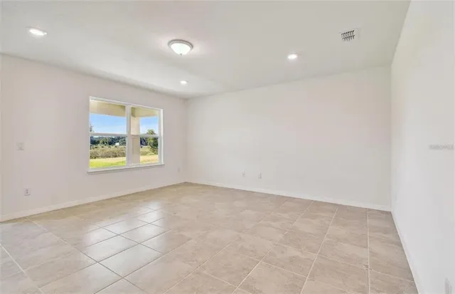 an empty room with windows