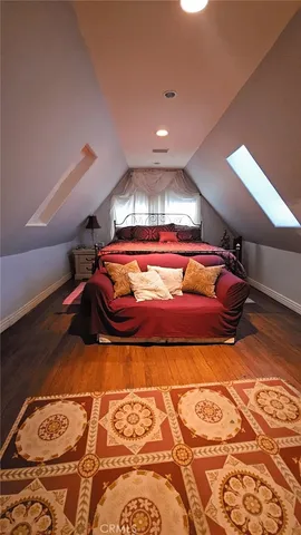 a view of staircase with white walls and a window