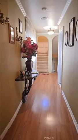a view of entryway with wooden floor