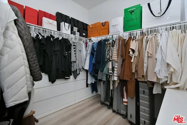 a bedroom with a bed and a table