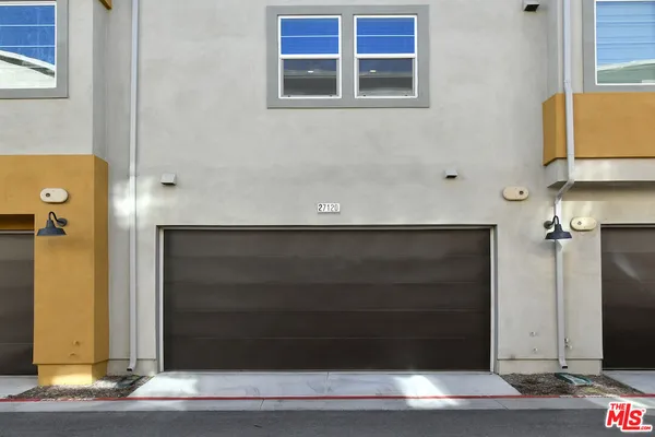 a house view with a garden space