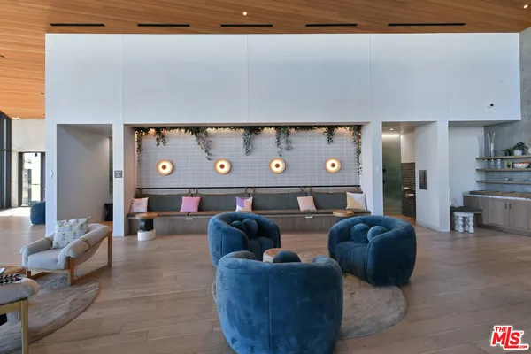 a kitchen with furniture and window