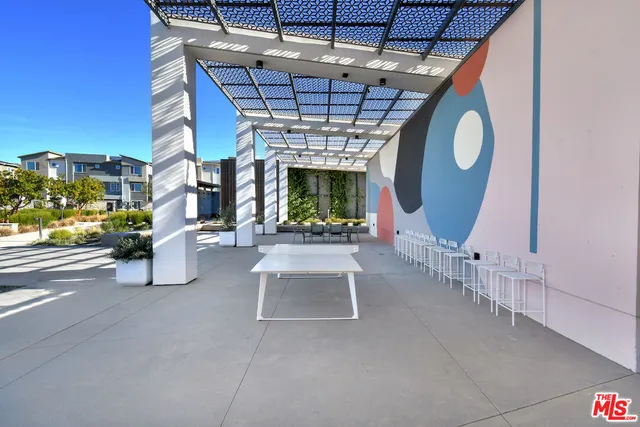 a view of a lake with a building in the background