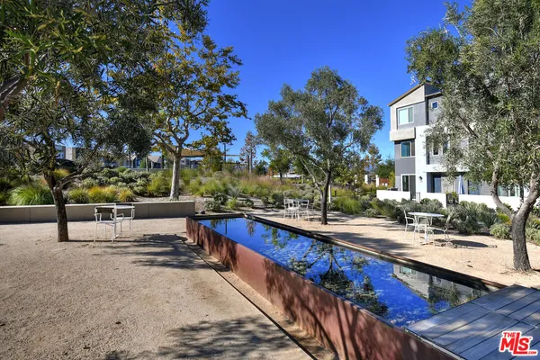a view of a city with lawn chairs
