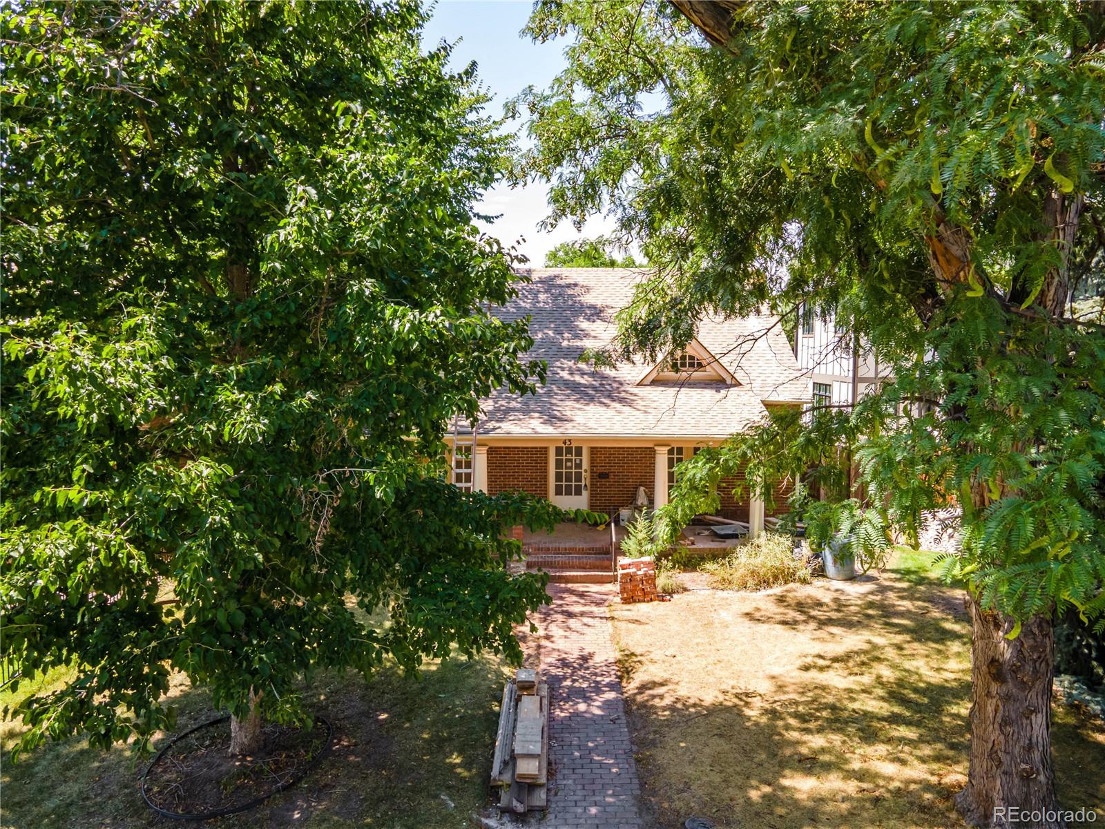 43 Albion Street Denver, CO 80220 - Photo 16 of 25 a view of house with yard