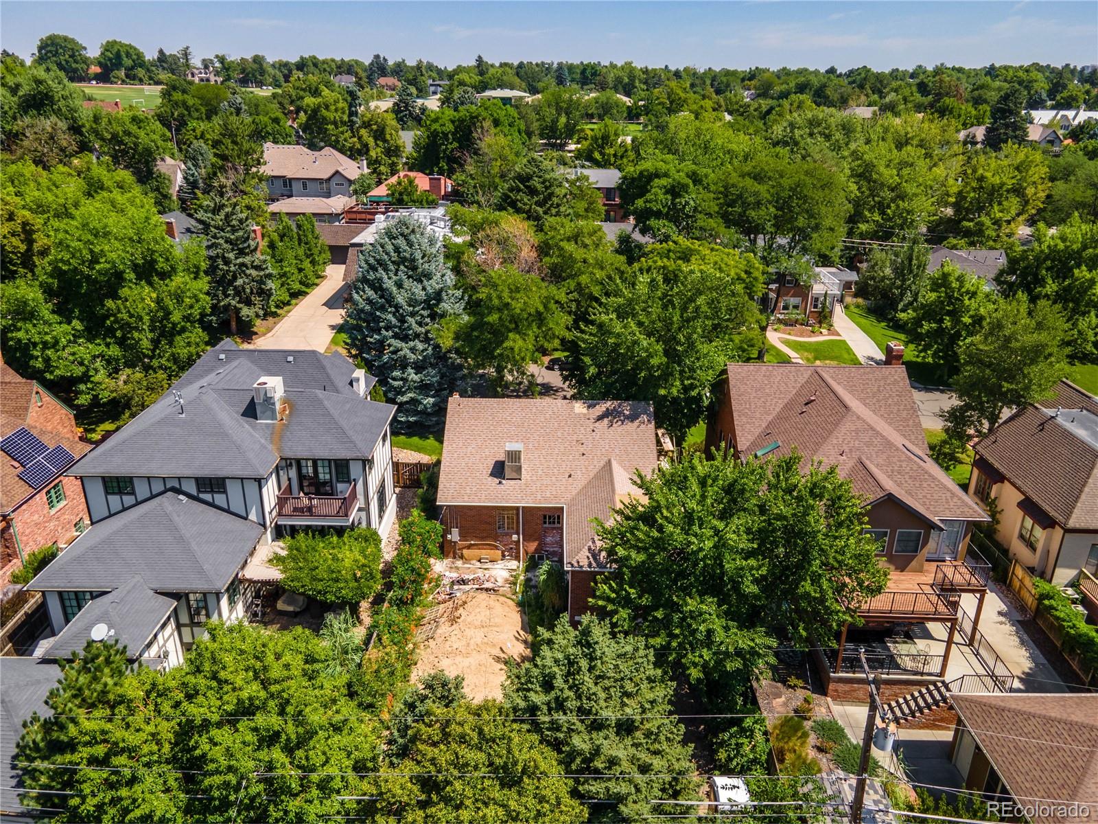 43 Albion Street Denver, CO 80220 - Photo 19 of 25 an aerial view of residential houses with outdoor space and trees all around