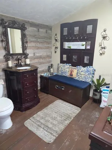 a outdoor living space with patio furniture and a potted plant