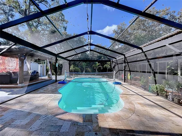 a view of a chairs and tables in the patio