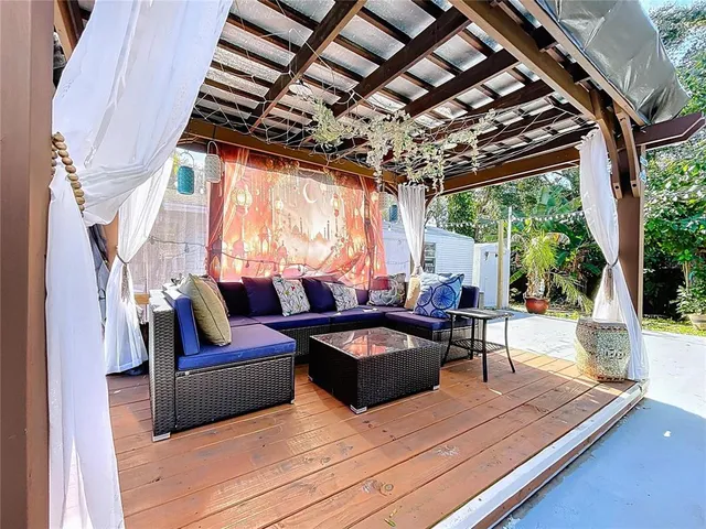 an aerial view of residential houses with outdoor space and street view