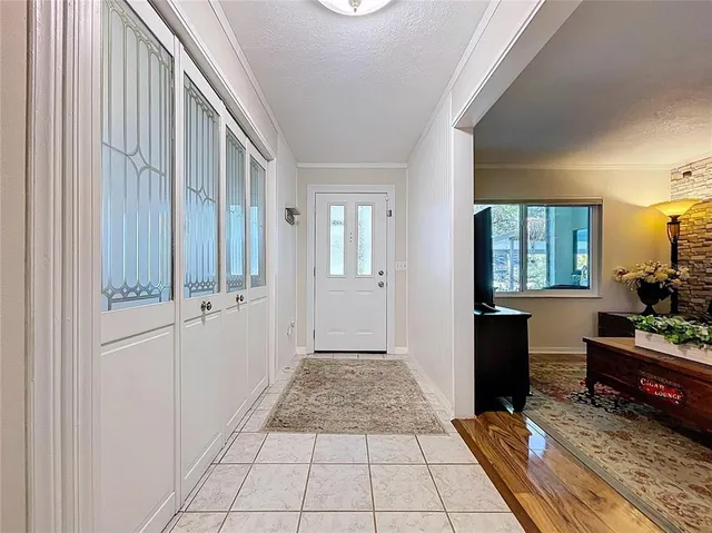 a kitchen with stainless steel appliances a stove a sink and a microwave