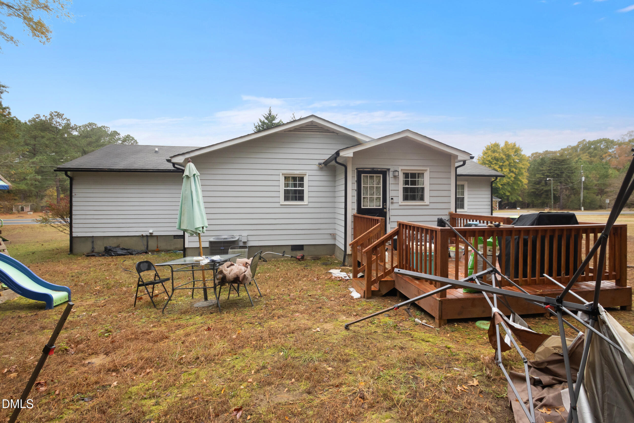 2930 Thomas Road Henderson, NC 27537 - Photo 11 of 17 a view of a house with backyard and sitting area