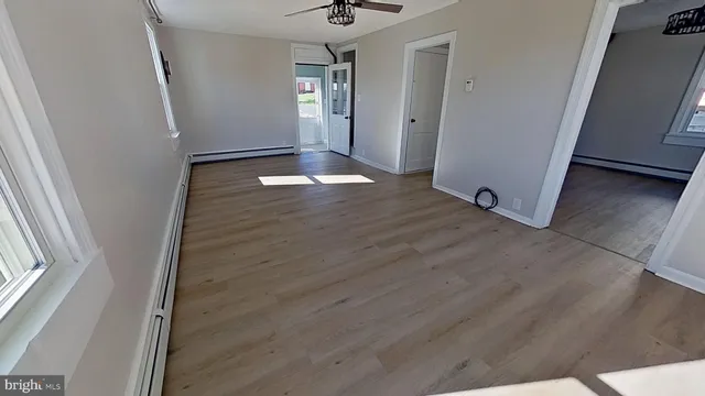 an empty room with windows