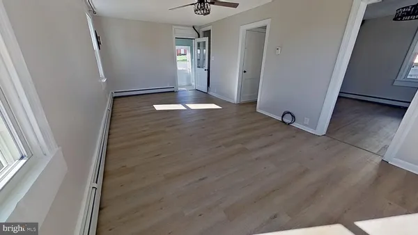 an empty room with windows