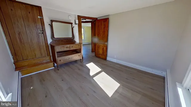 a view of entryway with wooden floor