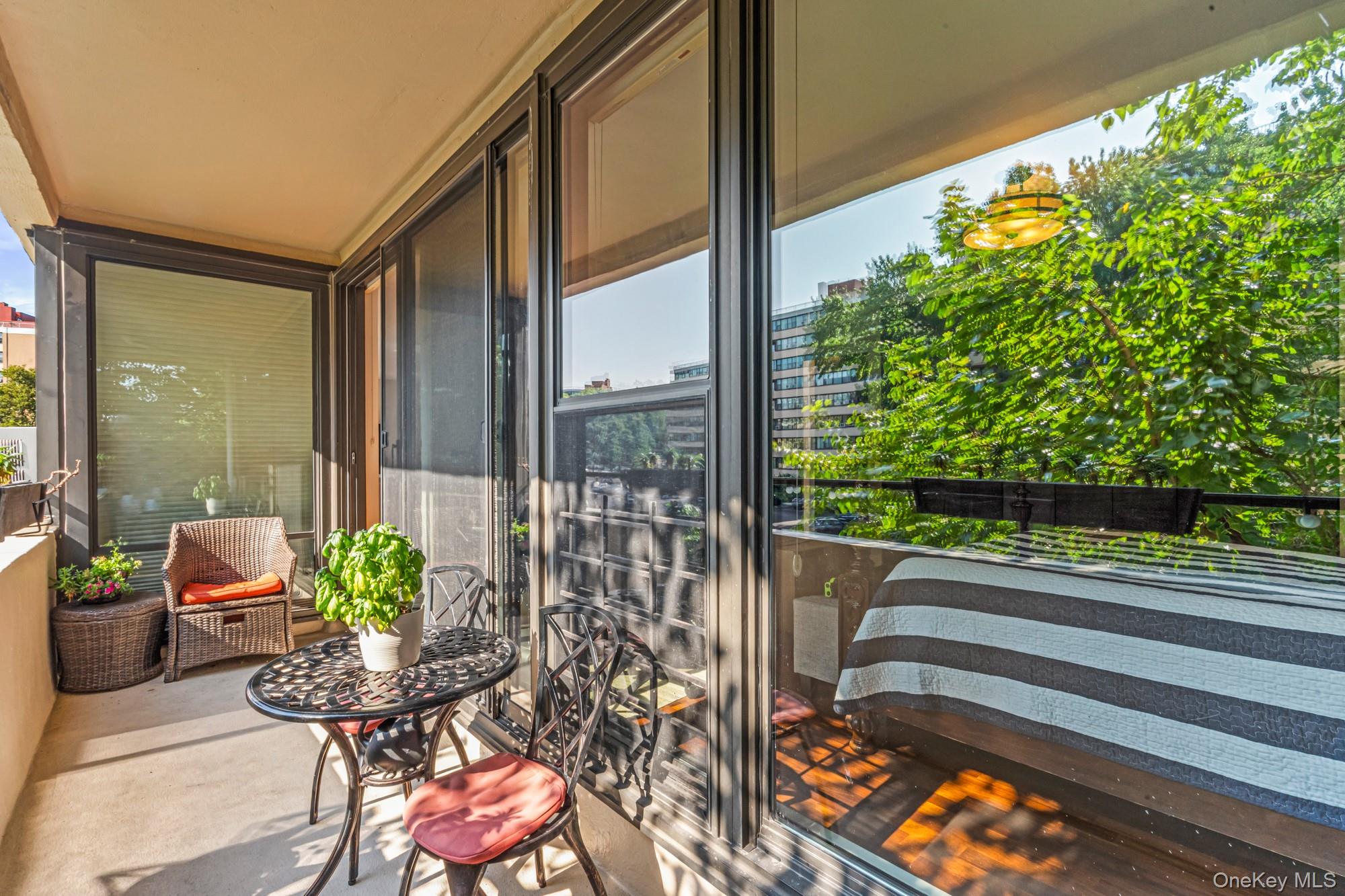 168-01 12th Avenue, Unit 3A Queens, NY 11357 - Photo 21 of 22 a house view with a seating space