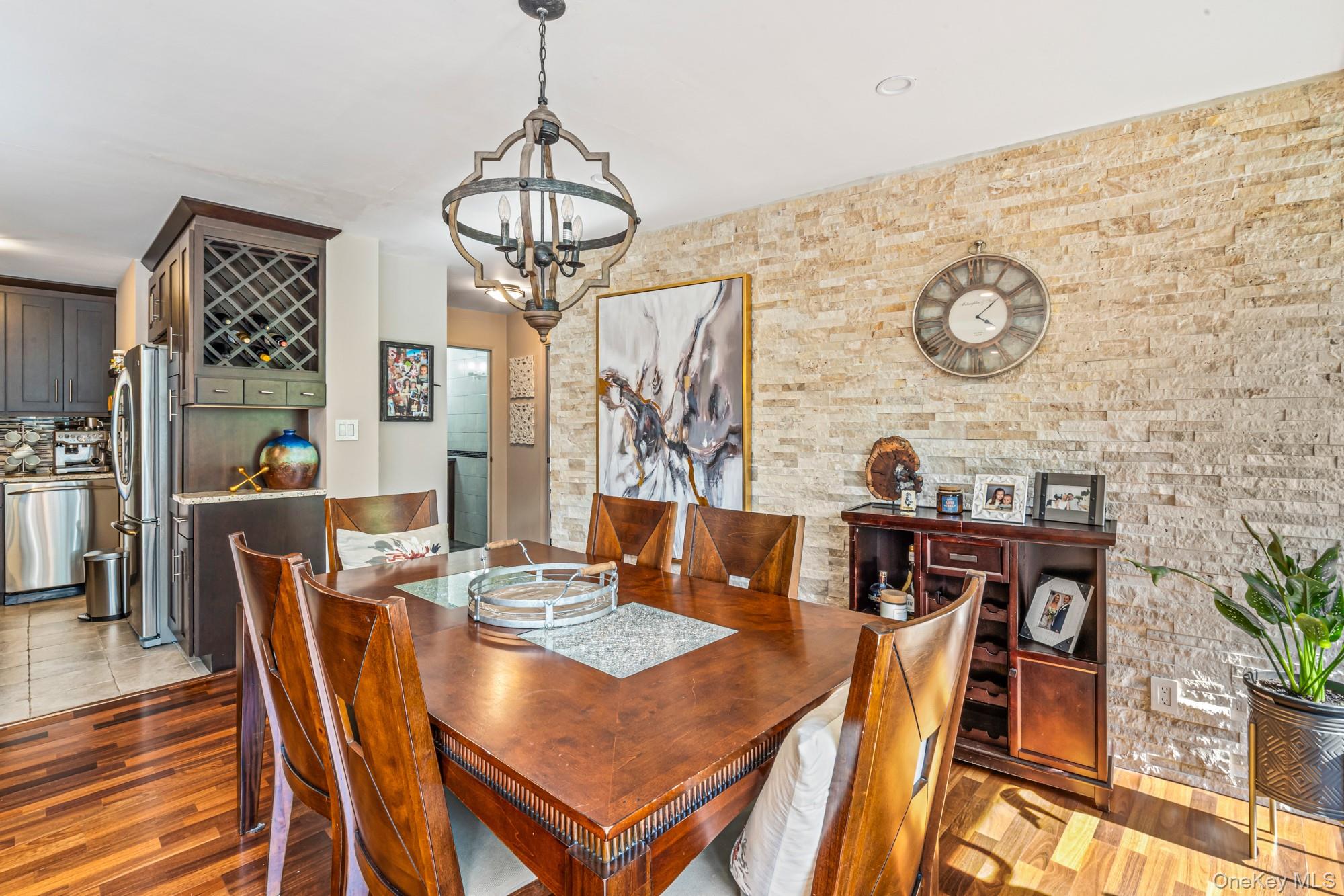 168-01 12th Avenue, Unit 3A Queens, NY 11357 - Photo 8 of 22 a view of a dining room with furniture window and wooden floor