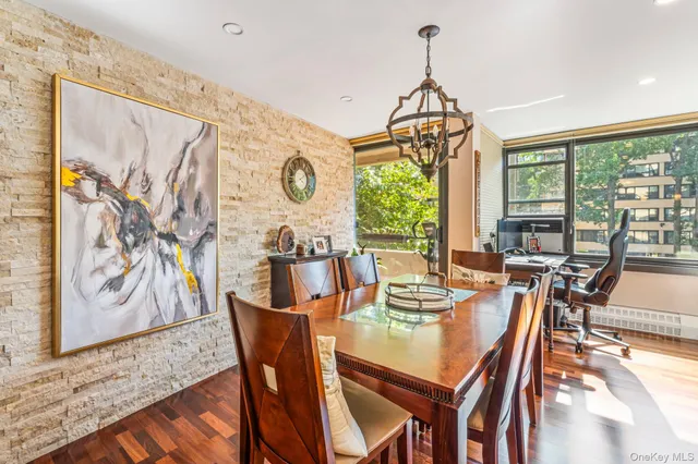 a view of a dining room with furniture window and outside view