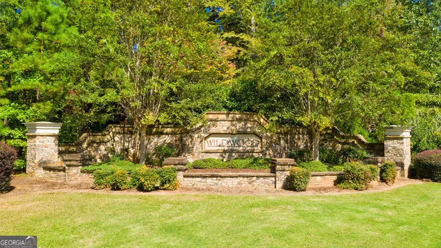 a view of a swimming pool with an outdoor space and seating area