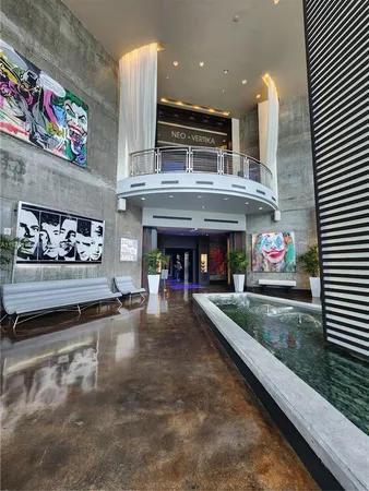 a view of swimming pool from a balcony