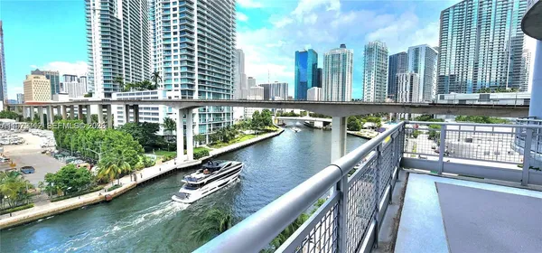 a view of a city with tall buildings