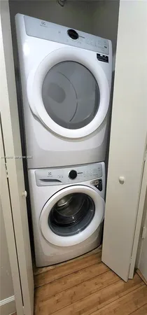 a view of a balcony with chairs