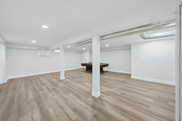 a view of a livingroom with wooden floor