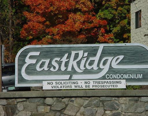 5 Nabby Road, Unit B142 Danbury, CT 06811 - Photo 1 of 1 a street sign on a wall next to road