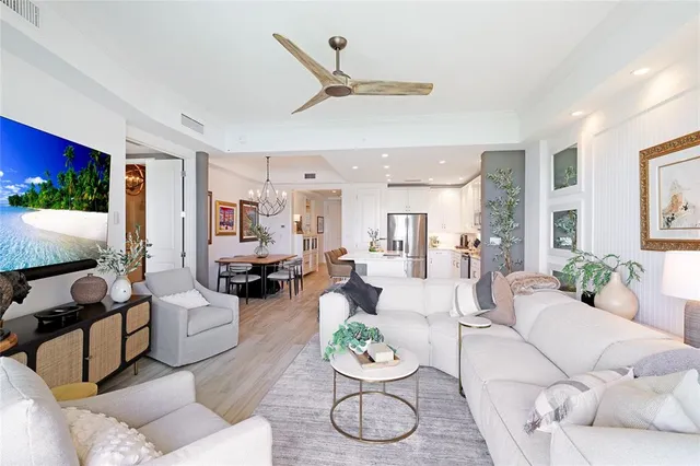 a bedroom with a large bed and a large window