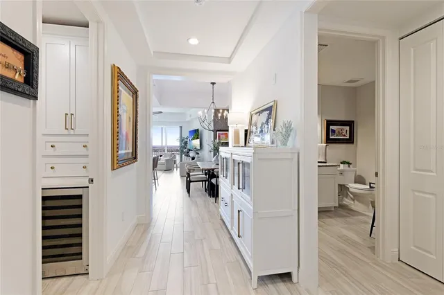 a view of a hallway with washer and dryer