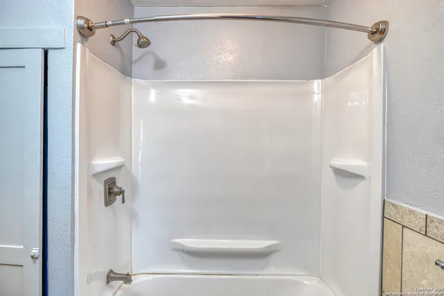 a bathroom that has a shower